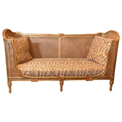 Vintage Italian gilt wood with parcel paint sofa and double Cain frame