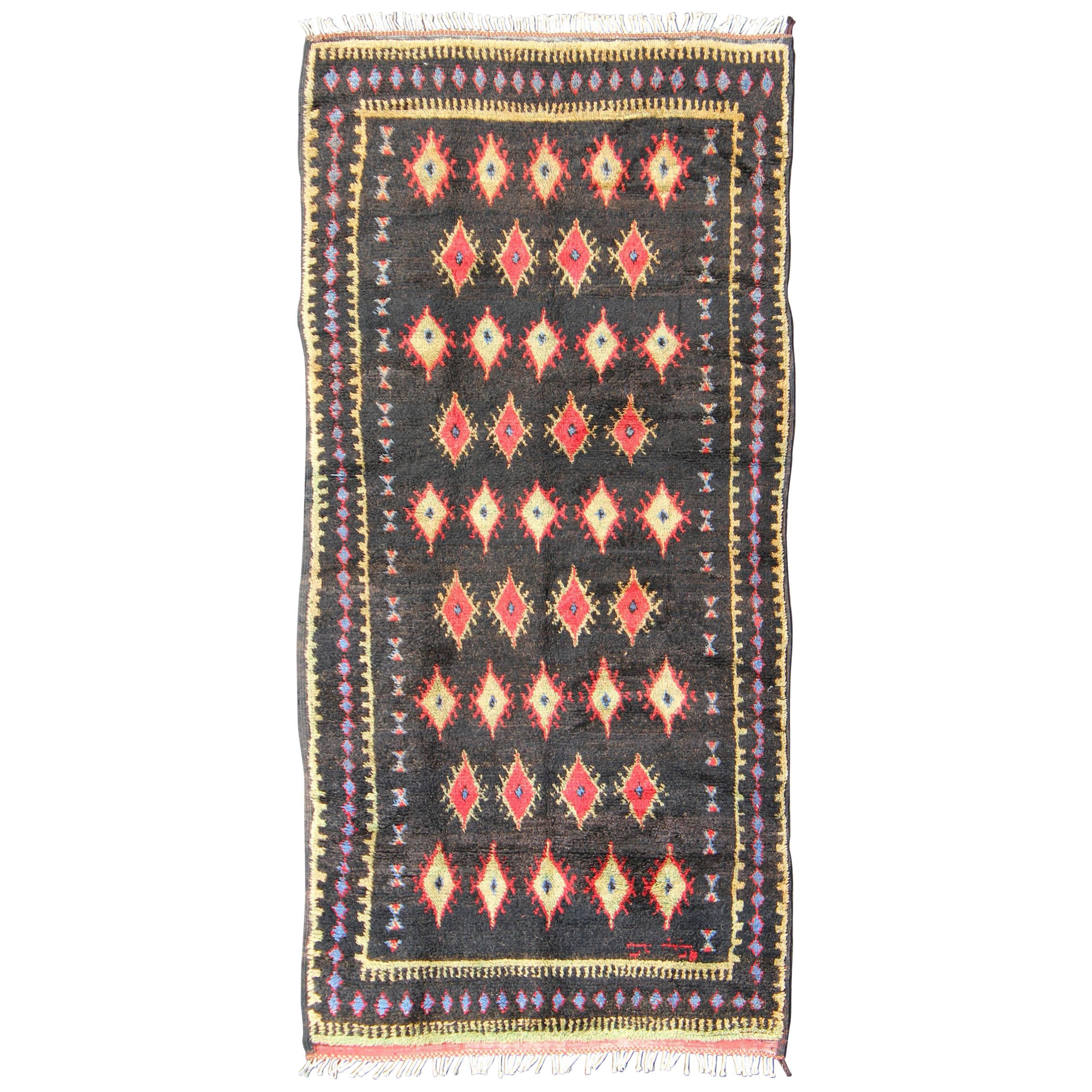 Charcoal Black Background Unique Vintage Moroccan Rug in Red and Yellow For Sale