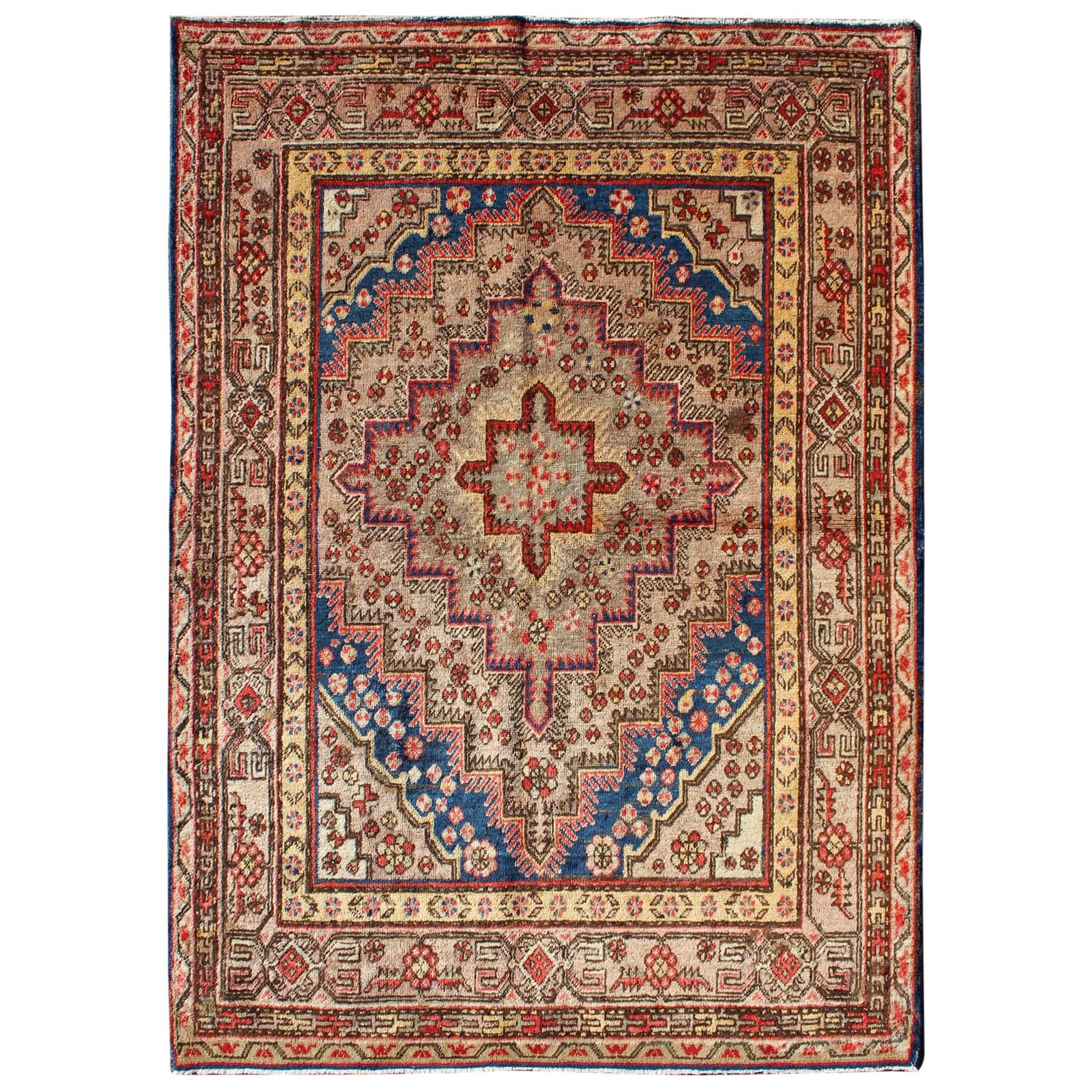 Colorful Antique Khotan Rug With Multi Layered  Medallion Pattern For Sale