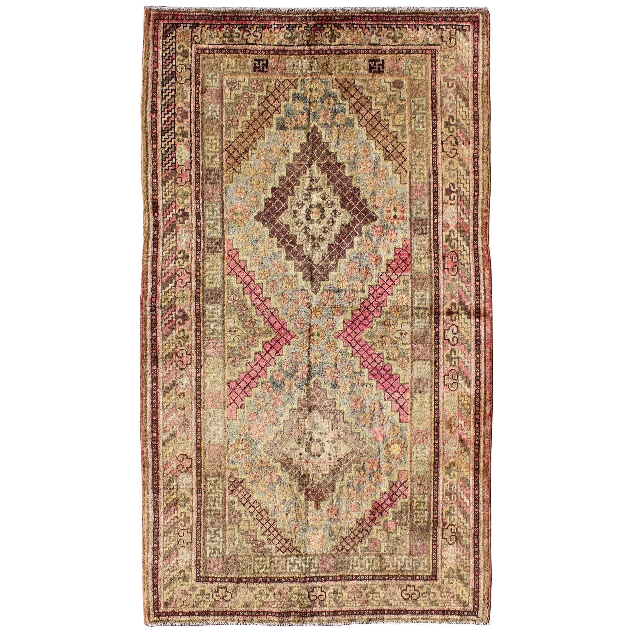 Early 20th Century Antique Khotan Rug with Paired Diamond Medallions in Wine Red