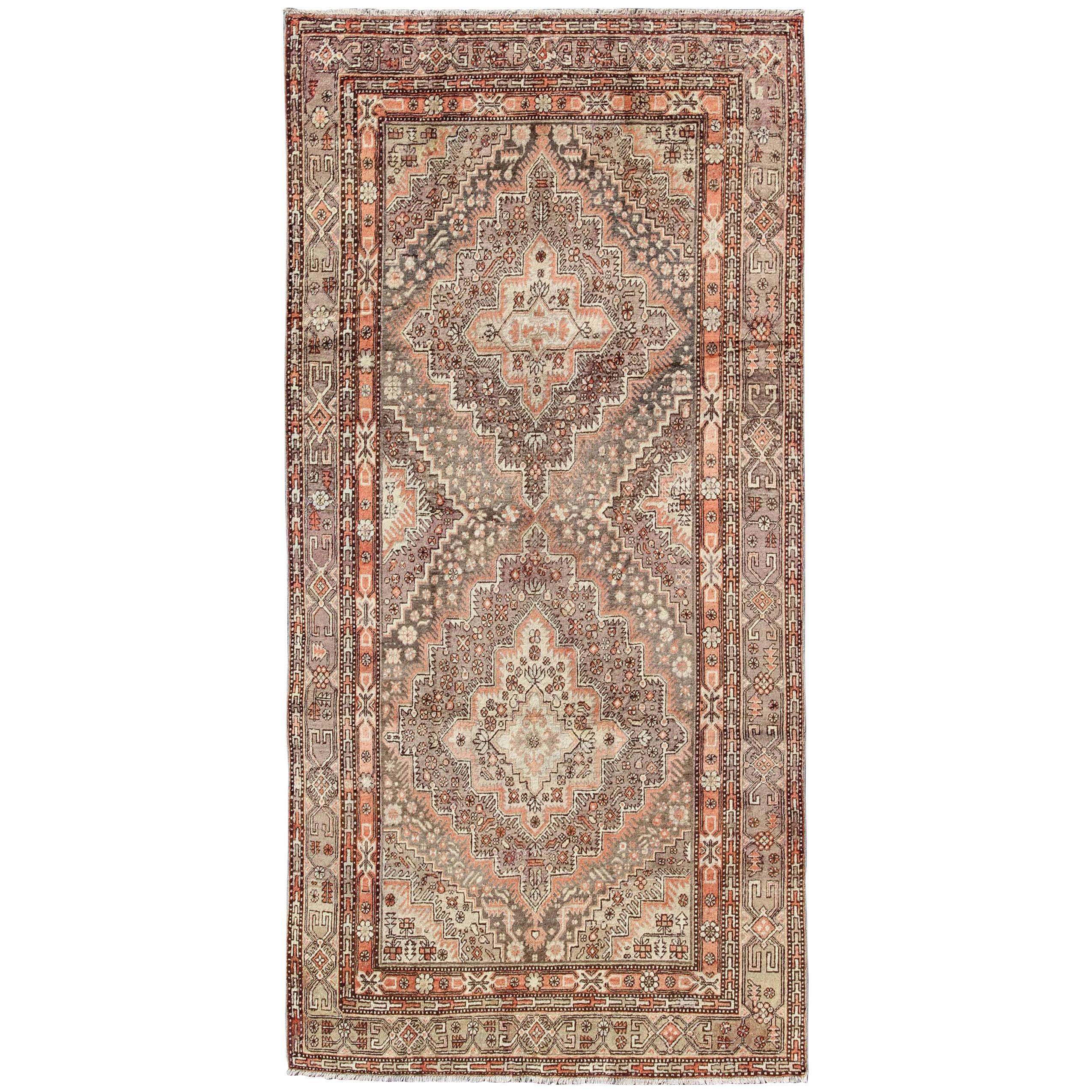 Early 20th Century Antique Khotan Rug with Paired Medallions in Gray and Red For Sale