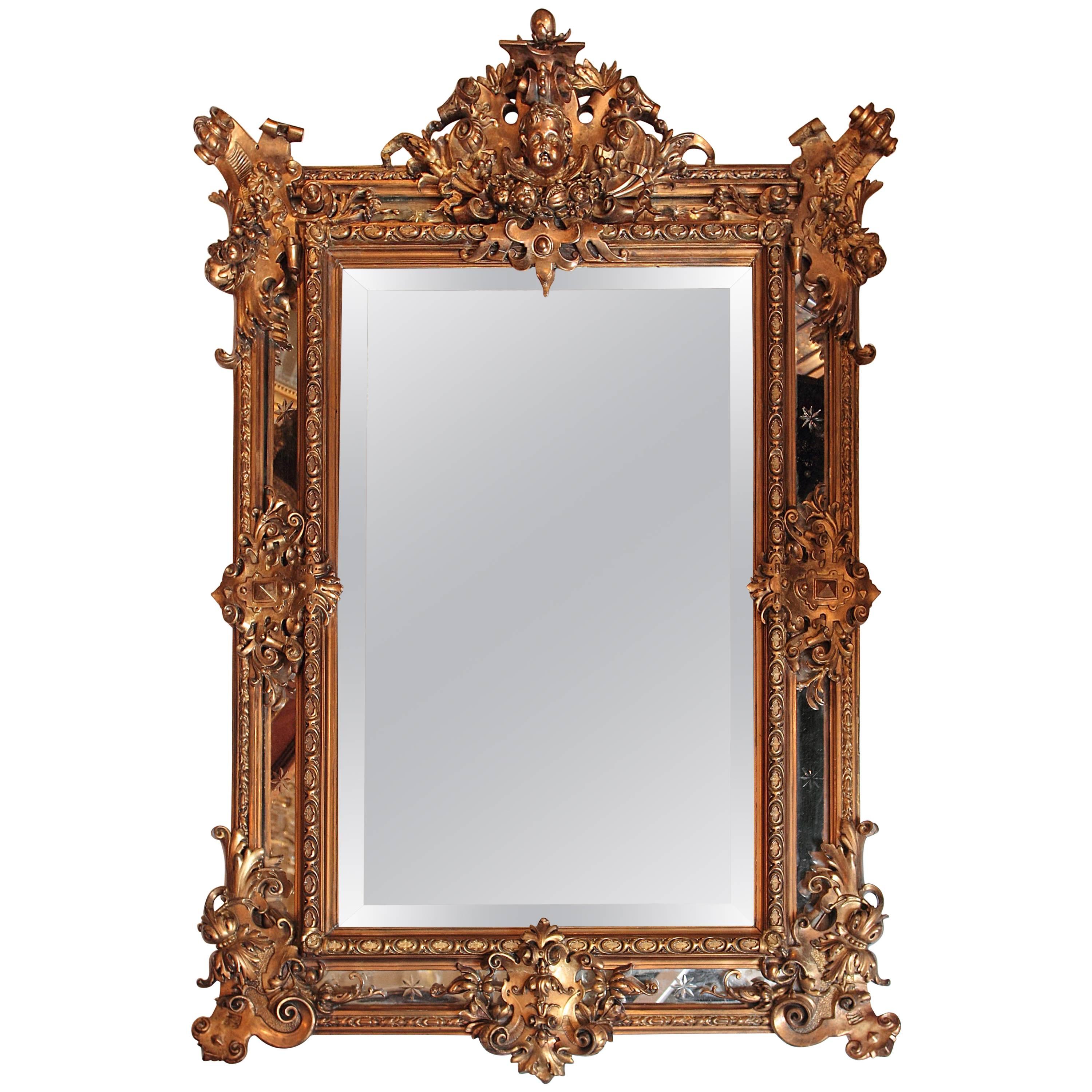 Miroir Louis Philippe français du 19ème siècle sculpté et doré