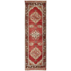 Midcentury Vintage Turkish Oushak Gallery Runner with Elegant Red Medallions