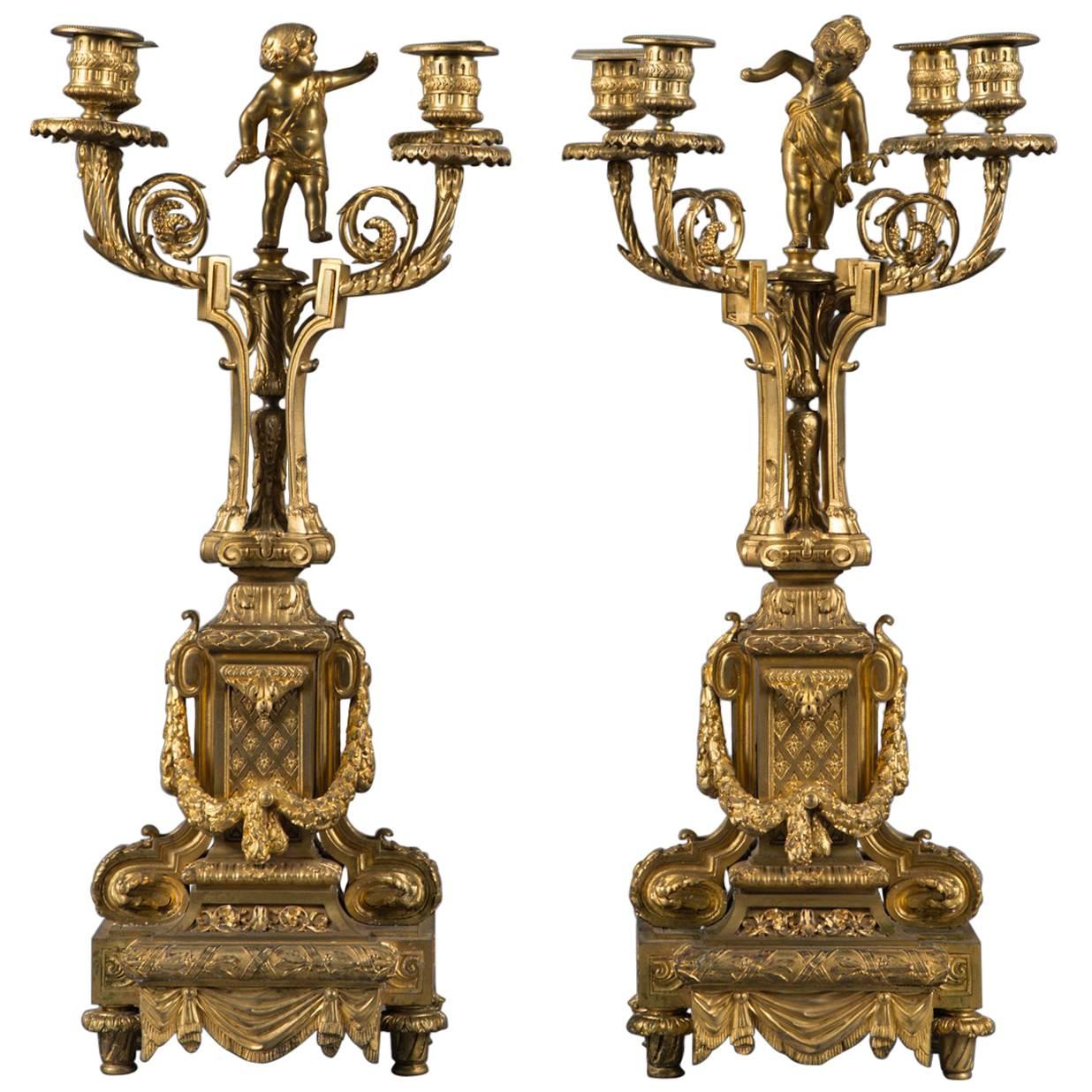 Pair of 19th Century French Gilt Bronze Four-Branch Figural Candelabras For Sale