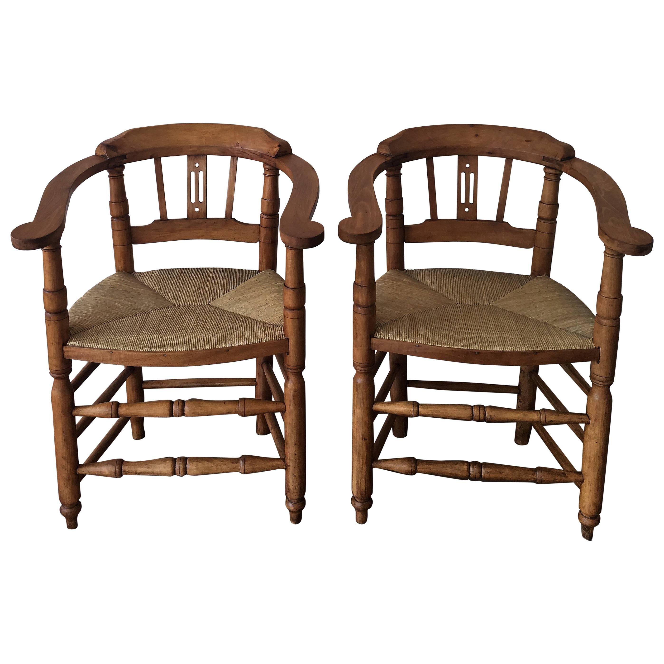 Pair of Spanish Horseshoe Back and Cane Armchairs