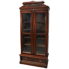 Monumental Antique Eastlake Carved Walnut Glass Front Bookcase, circa 1880