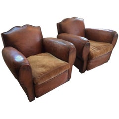 Authentic Pair of Distressed French Vintage Moustache Style Leather Club Chairs