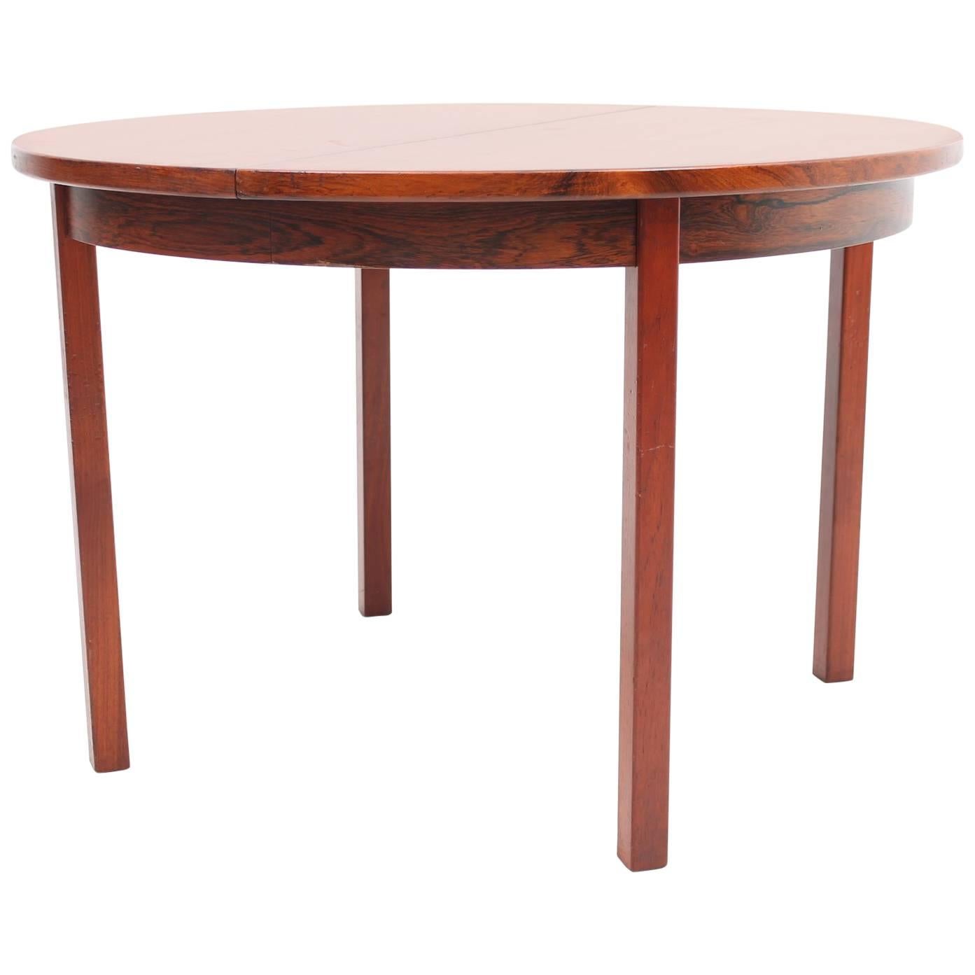 Circular Rosewood Dining Table with Self Storing Leaves, Scandinavian Modern For Sale