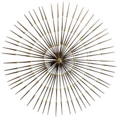 Mid-Century Gilded Metal Sunburst Wall Sculpture by Ron Schmidt