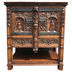 Vintage Gothic Revival Carved Oak Cabinet Depicting The Annunciation To The Virgin Mary
