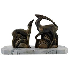 Pair of French Art Deco Bookends in Bronze on Marble Base