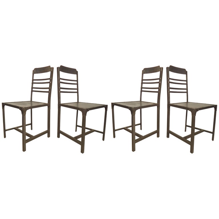 Set of 4 Industrial Metal and Leather Chairs at 1stdibs