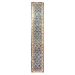 Ancien tapis persan du Nord-Ouest ancien avec motif cachemire sur fond bleu marine.