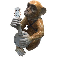Italian Faience Pottery Sculpture of a Monkey Musician