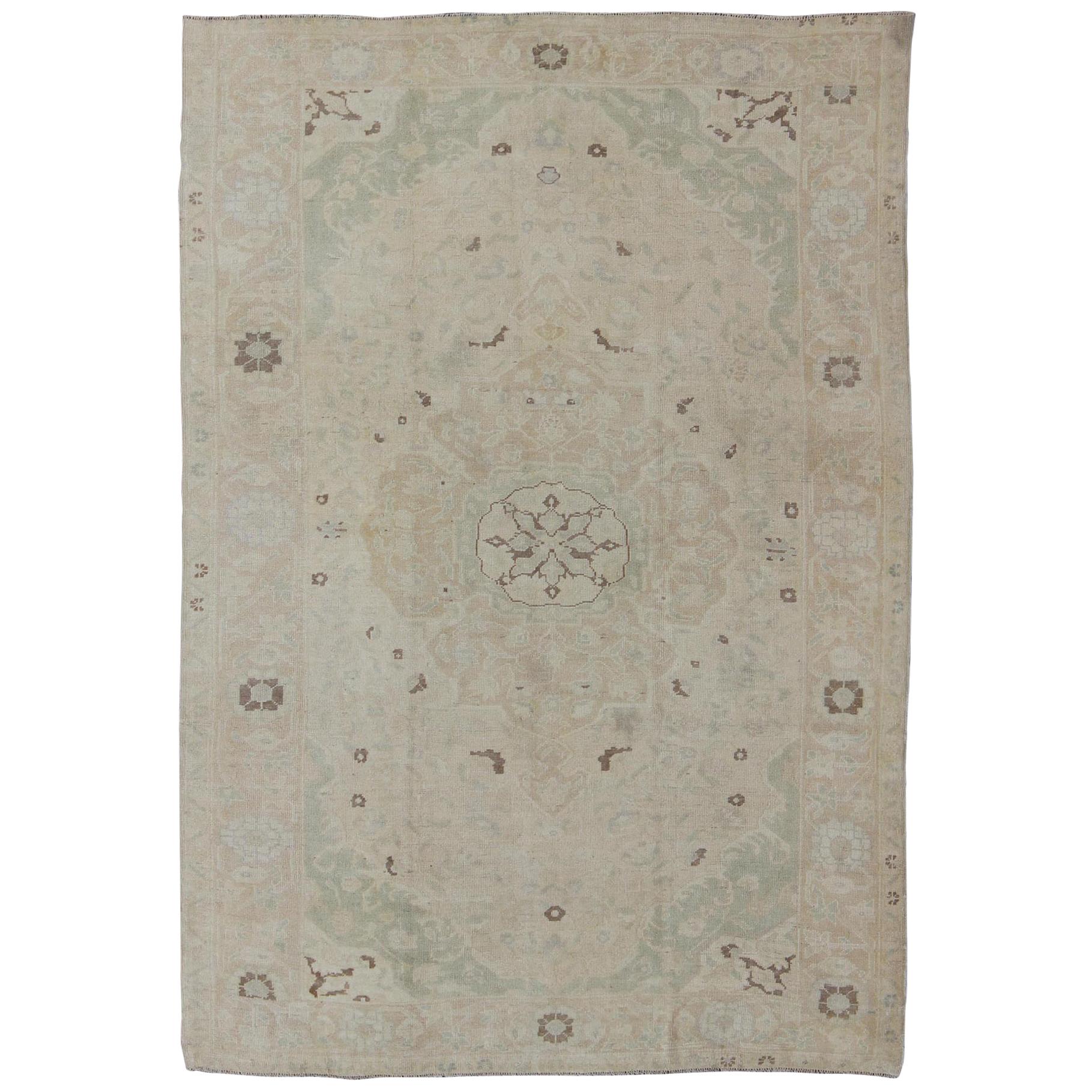 Muted Turkish Oushak Rug with Medallion in Shades of Taupe, Light Brown & Green