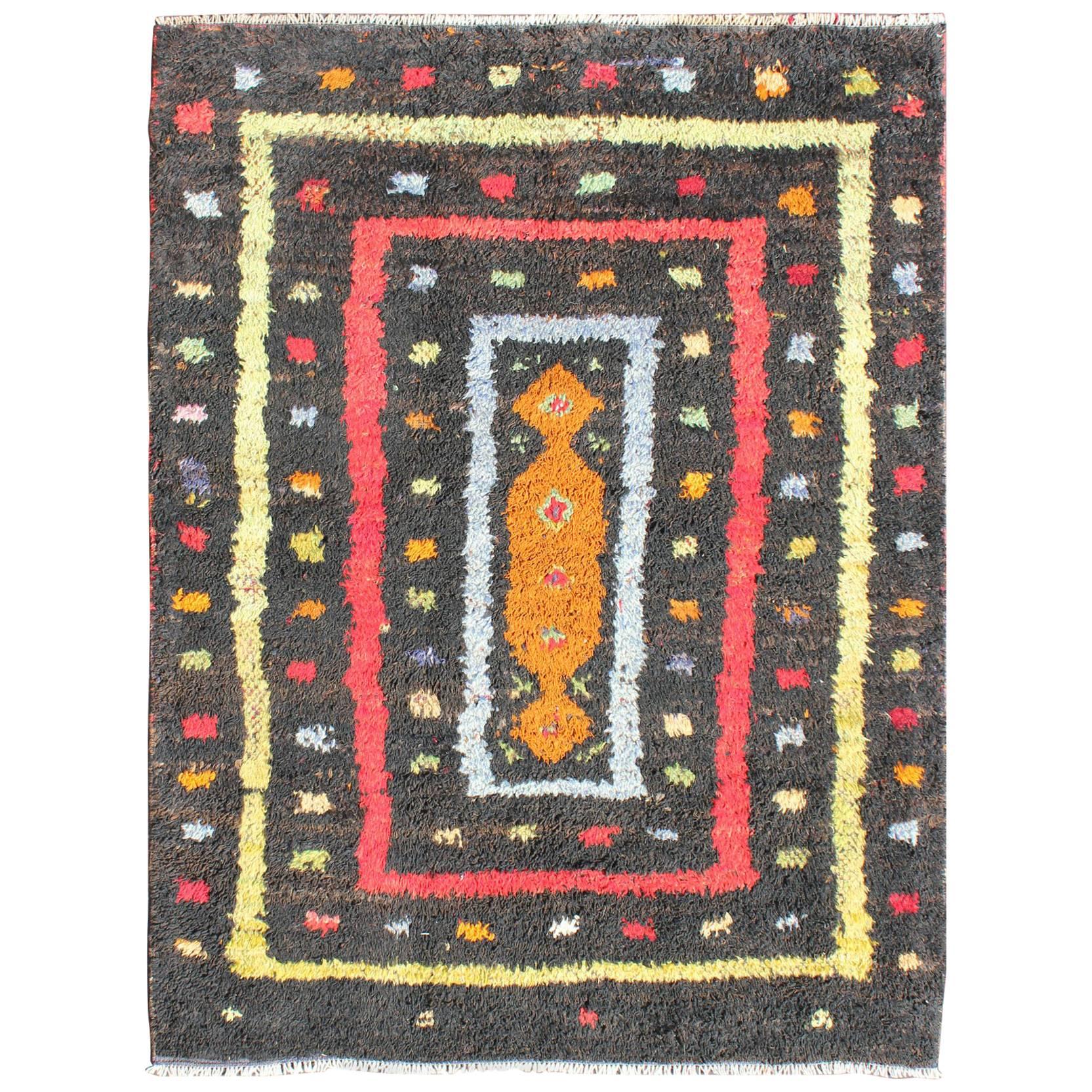 Vintage Turkish Tulu Rug with Tribal Pattern in Black, Yellow, Red, Blue and Red