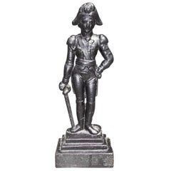 Antique American Cast Iron Napoleon Doorstop Standing on a Step Back Plinth, Circa 1870