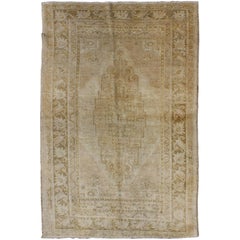 Midcentury Vintage Turkish Oushak Rug with Central Medallion Design in Brown Midcentury Vintage Turkish Oushak Rug with Central Medallion Design in Brown