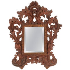 Italian Baroque Style Carved and Salmon Painted Wood  Mirror