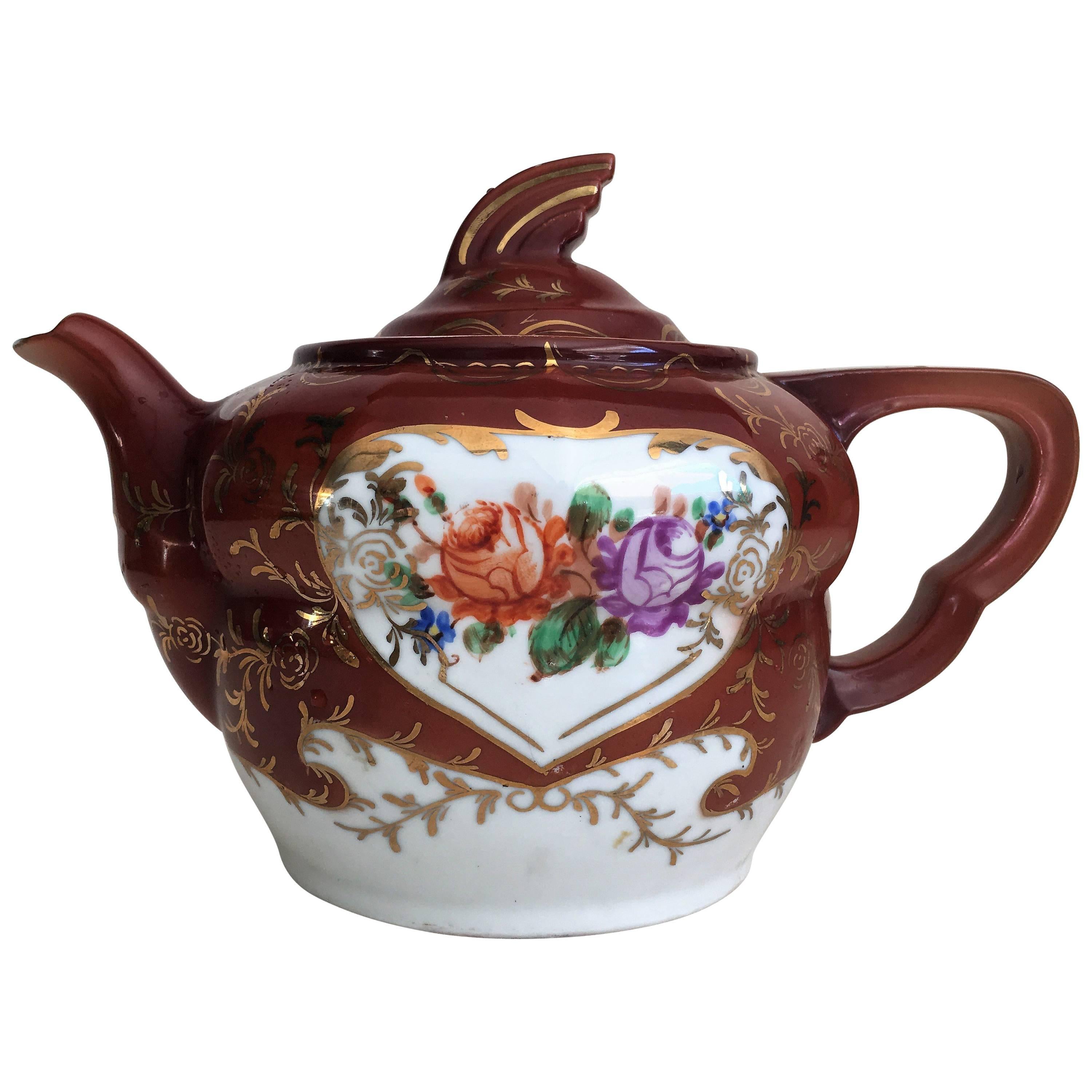 Plum Red-Ground Saltglaze Stoneware Teapot and Cover, circa 1940 For Sale