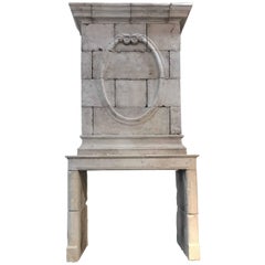 18th Century Limestone Mantel with Hand-Carved Trumeau