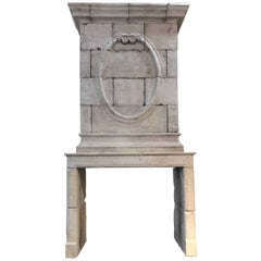 18th Century Limestone Mantel with Hand-Carved Trumeau