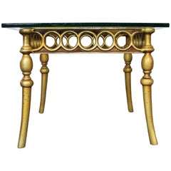 Hollywood Regency Art Deco Style Glass Topped Side Table of Gilded Cast Aluminum