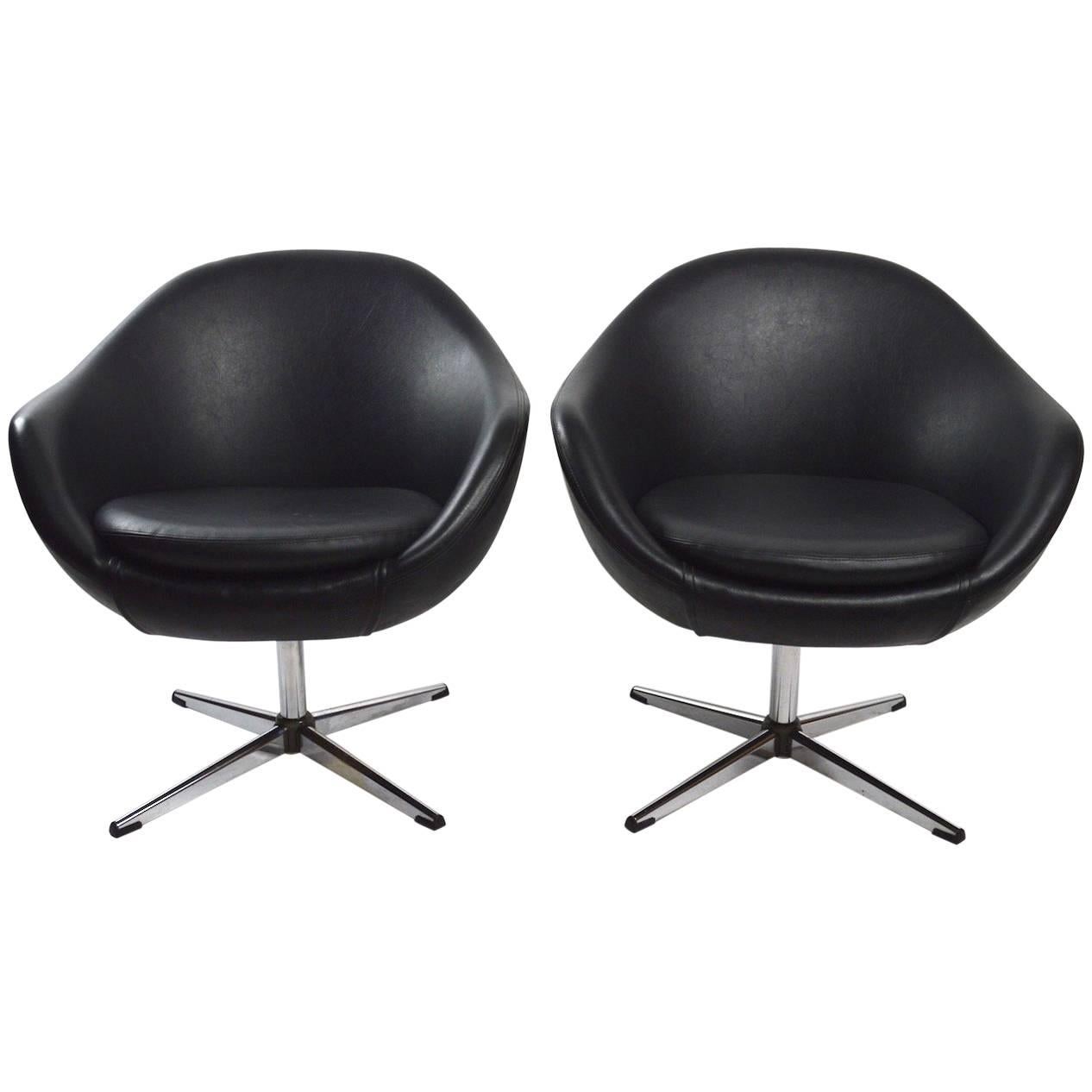 Pair of Overman Swivel Chairs