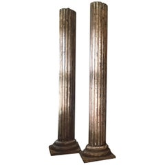 Pair of Patinated Wooden Columns