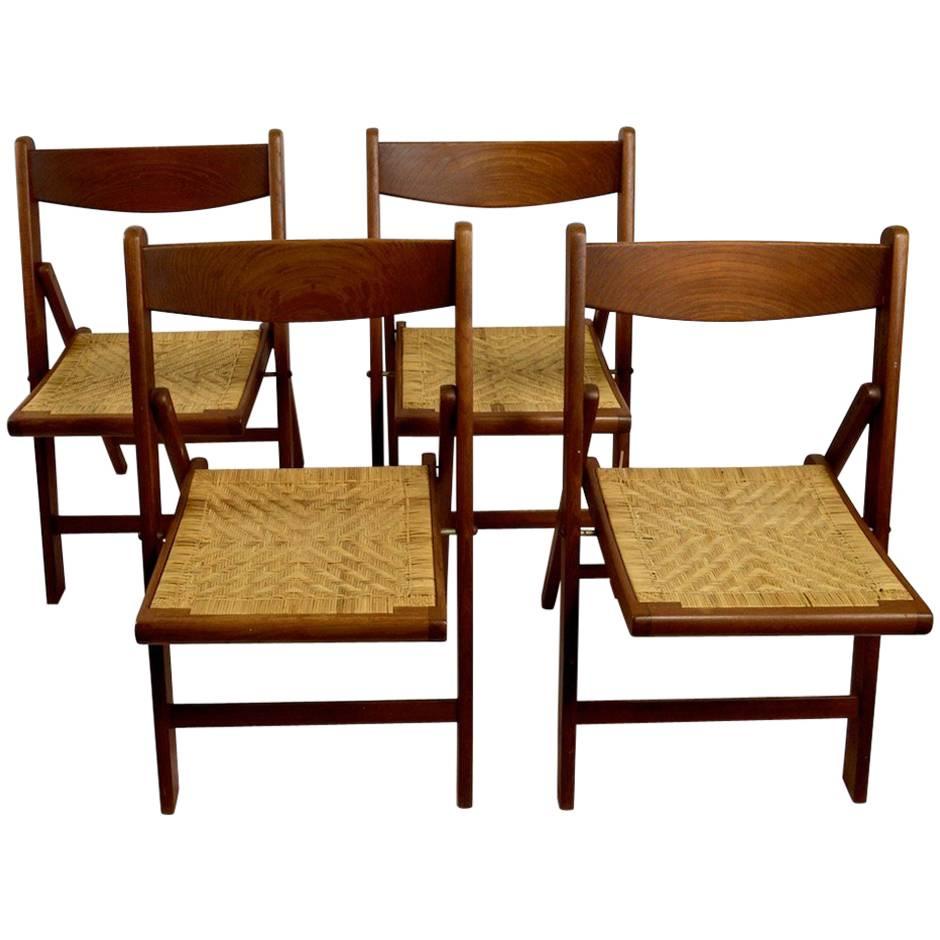Set of Four Danish Modern Folding Chairs of Solid Teak and Cane