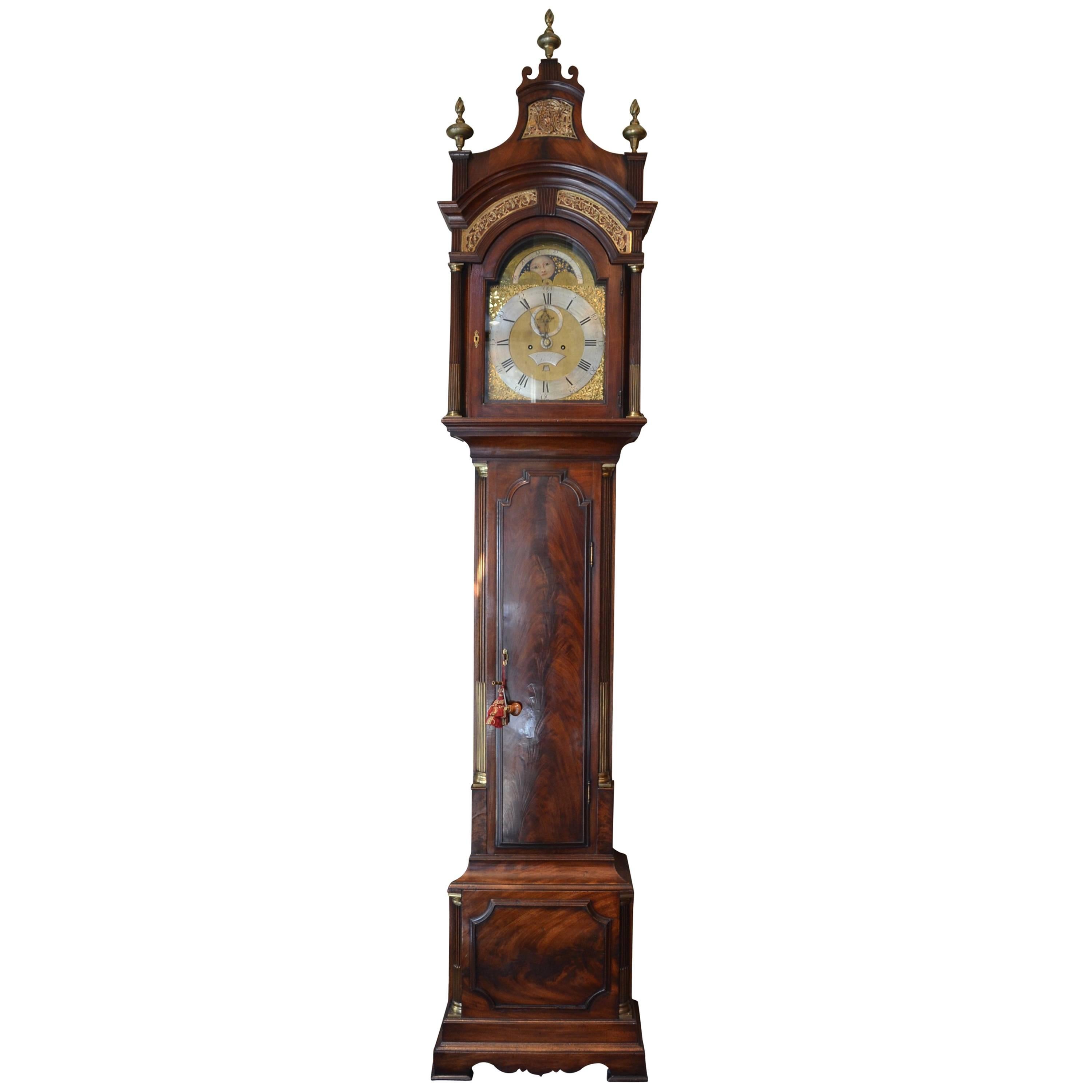 Antique English George III Flame Mahogany Tall Case Clock by Peter Pohlman