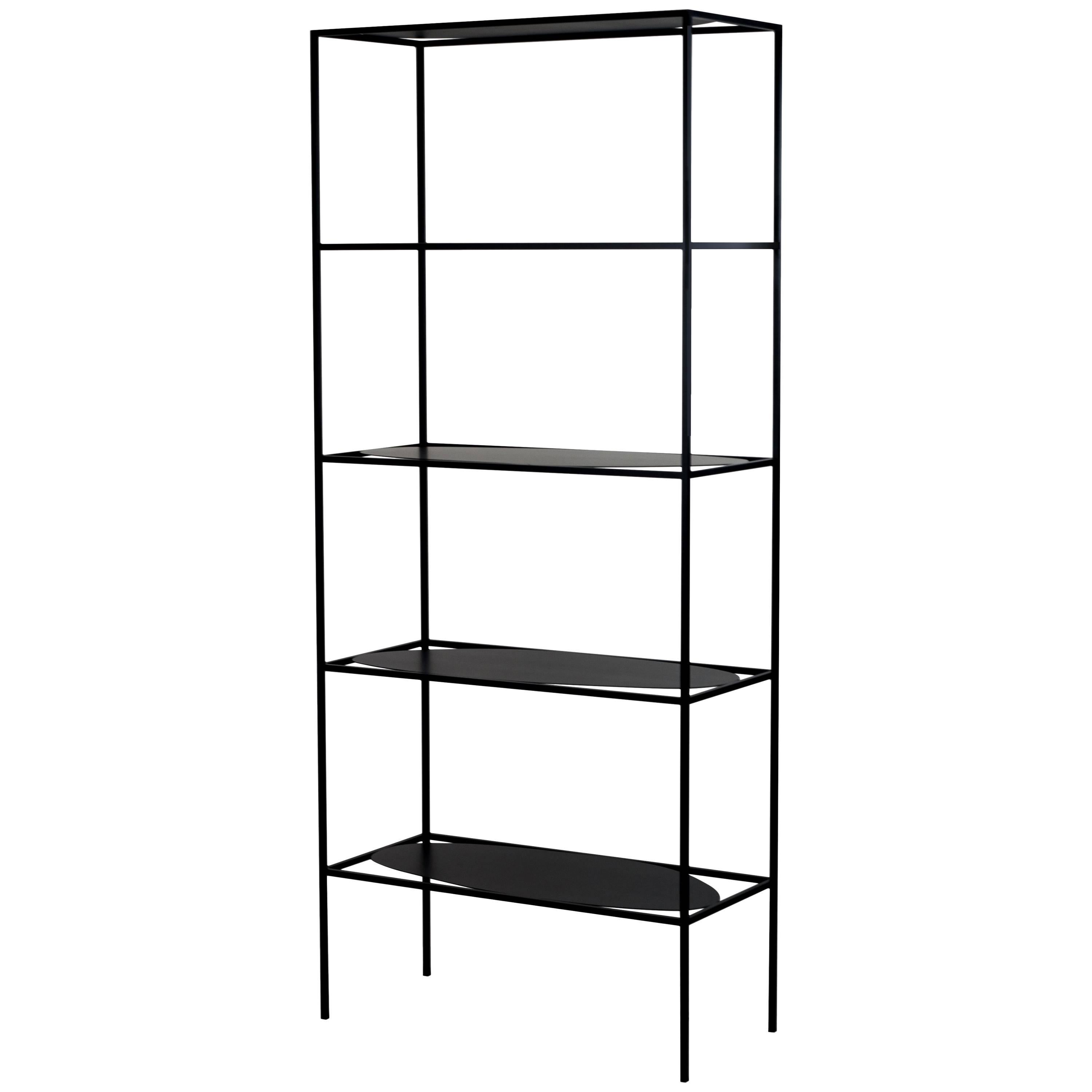 The contemporary modern Black Steel Ahn etagere is a study in positive and negative space. With its five different asymmetrical and organic surfaces, Ahn is a minimal sculpture in its own right, playing with balance and tension between the shelves
