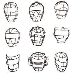Antique Collection of Nine Metal Catchers Masks