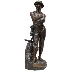 Bronze Figure of a Miner