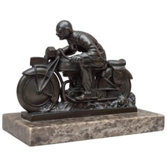 Antique Motorcycle and Rider Statue