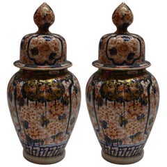 Pair of Antique Imari Vases and Covers