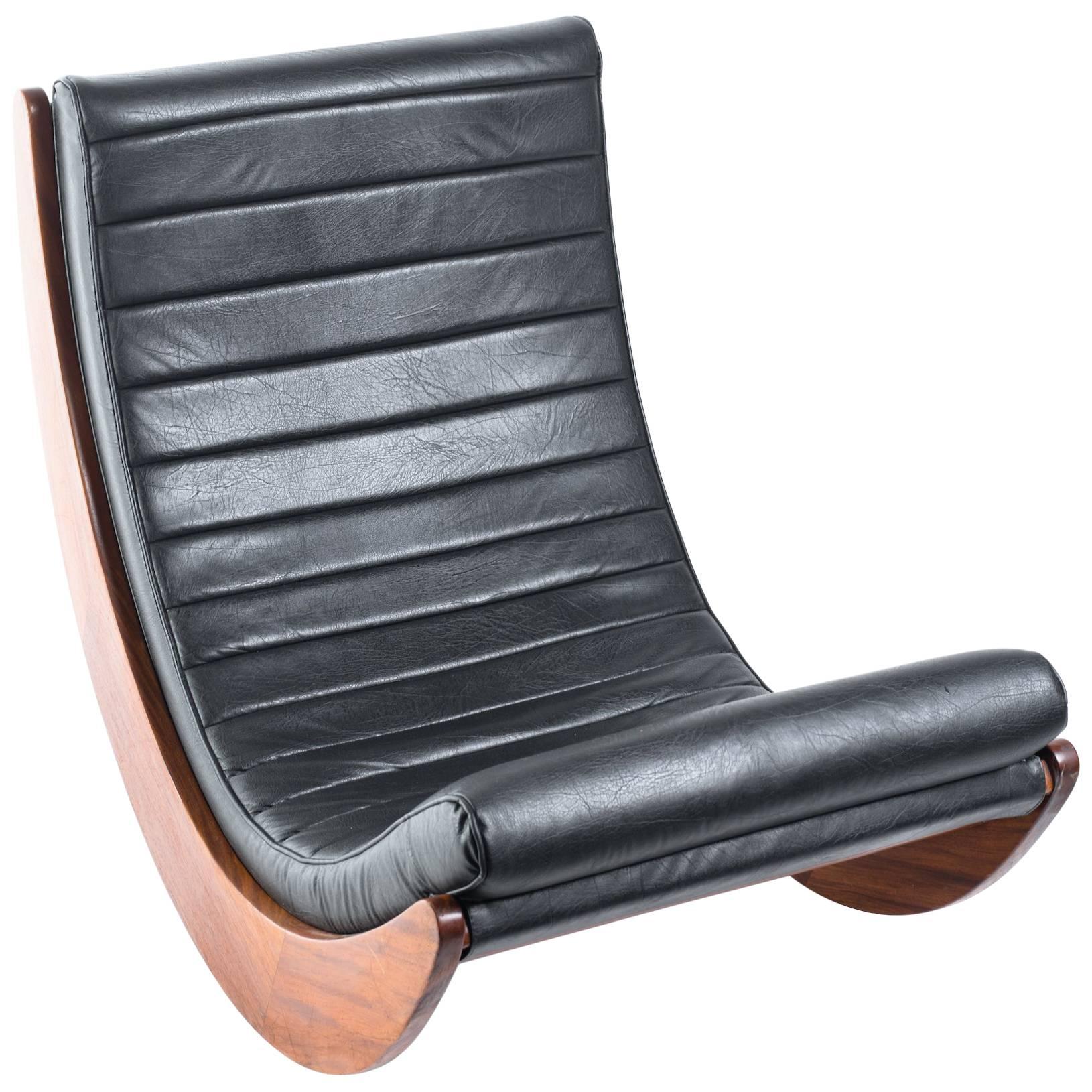 Klein Dienst sculptural faux leather rosewood rocker. Originally purchased in 2005 for $4500.00 at the International Contemporary Furniture Show in NYC.