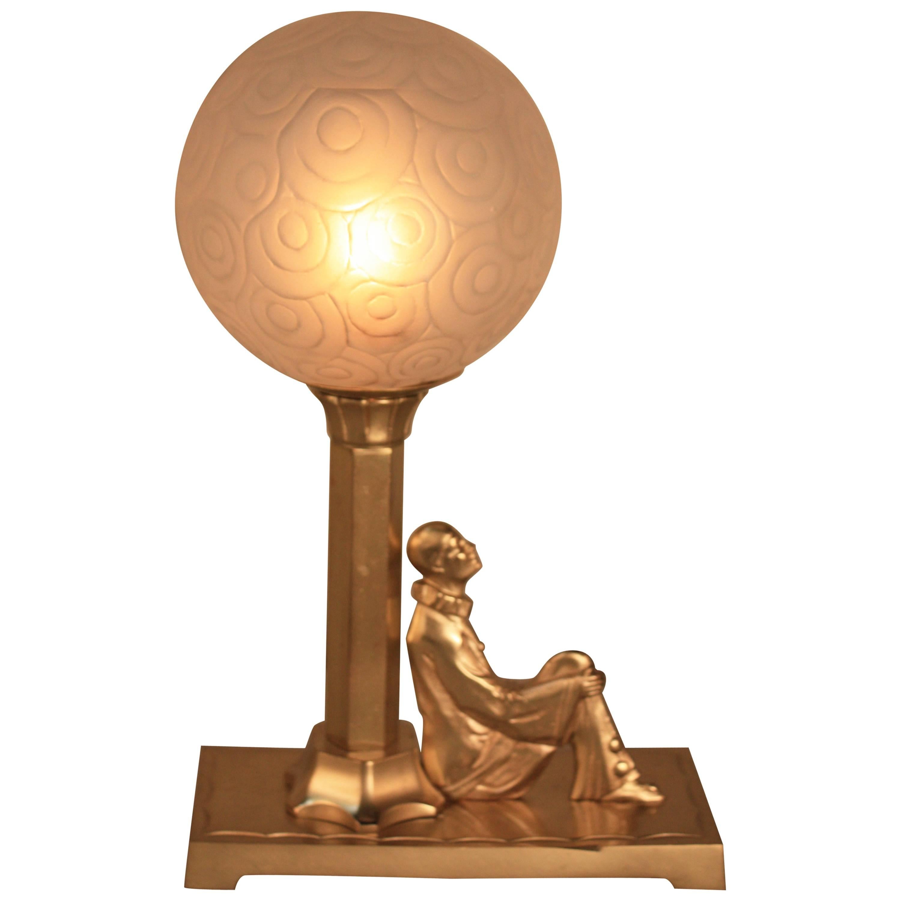 Art Deco Bronze Harlequin and Glass Shade Table Lamp