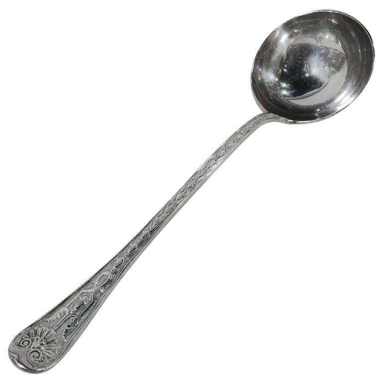 Stylish and Heavy English Victorian Sterling Silver Soup Ladle For Sale