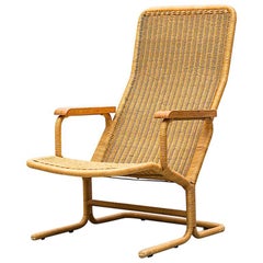 Dirk Van Sliedregt Rattan Lounge Chair with Wood Arms