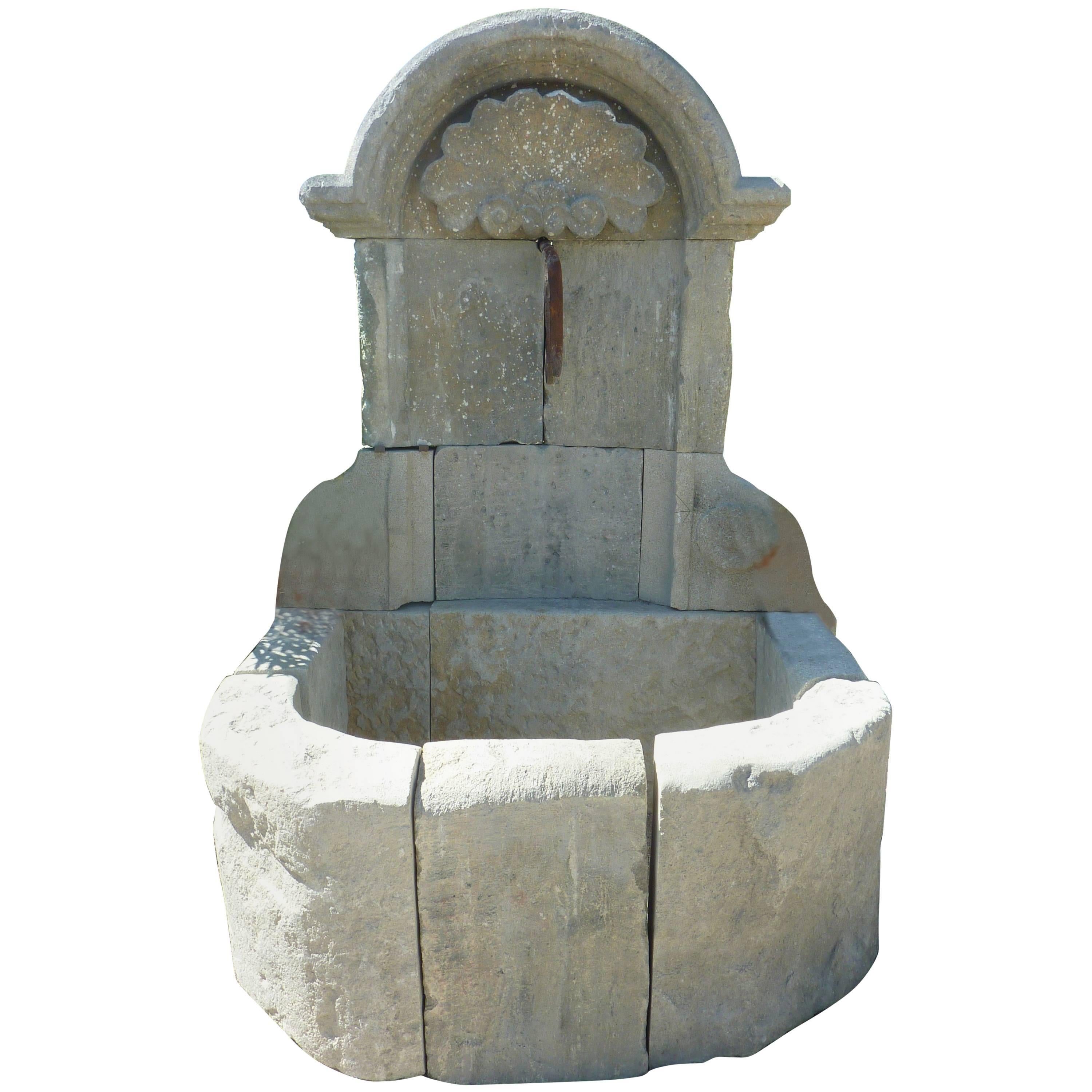 Ancient French Regence-Style Wall-Fountain Carved in Patinated Stone, Provence For Sale