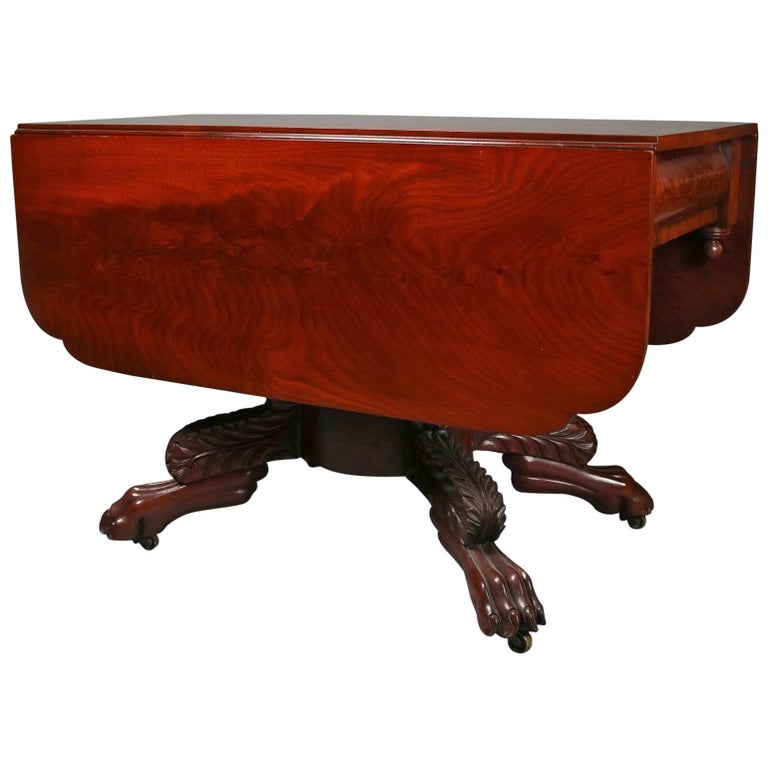Antique Carved American Empire Flame Mahogany Pedestal DropLeaf Table