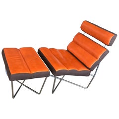 Unusual Chair and Ottoman Done in Orange Distressed Leather