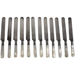 Aetna Works Mother-of-Pearl and Sterling Silver Place Knives, a Set of 12