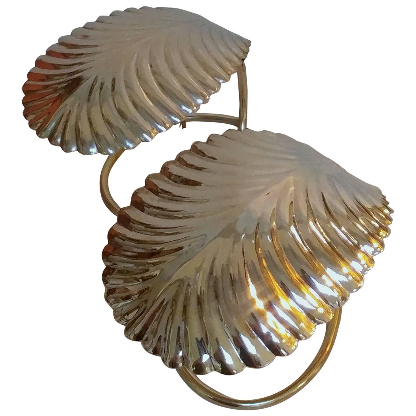 Pair of "leaf" table lamps in the manner of Tommaso Barbi. The brass plate leaf with patina throughout, some wear and minor pitting as expected due to age and normal use.