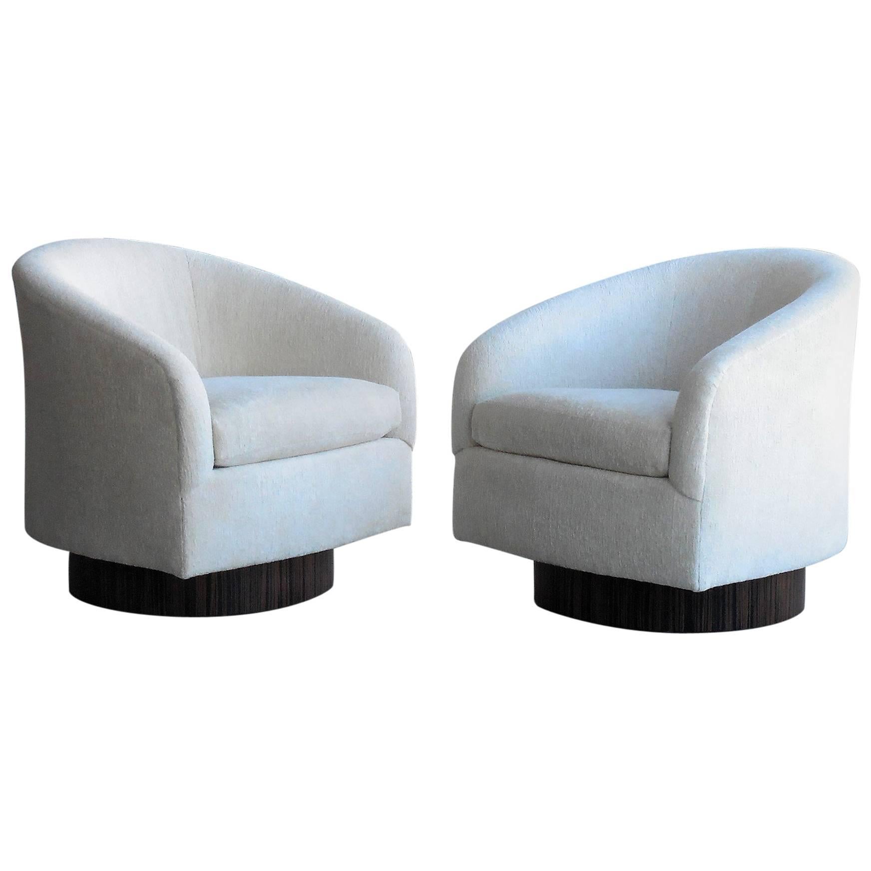 Pair of Plush Swivel Chairs with Macassar Bases