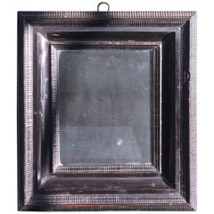 18th Century Flemish Ebonized Ripple Molded Cabinet Mirror