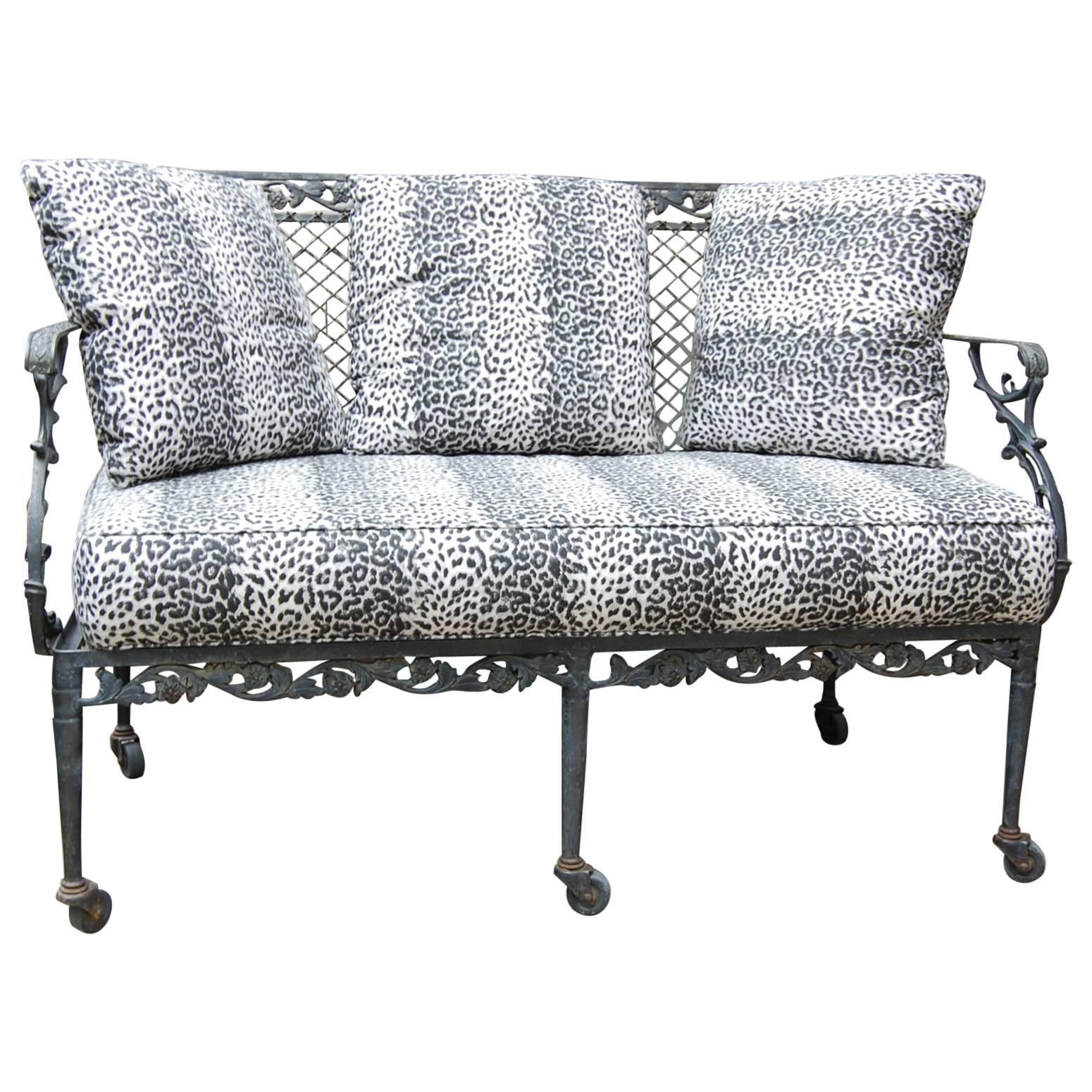 Settee with Cast Iron Scroll Work and Wire Mesh Back in Regency Style For Sale