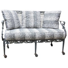 Settee with Cast Iron Scroll Work and Wire Mesh Back in Regency Style