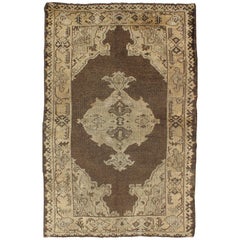Chocolate Background Vintage Turkish Oushak Rug with Floral Medallion in Cream